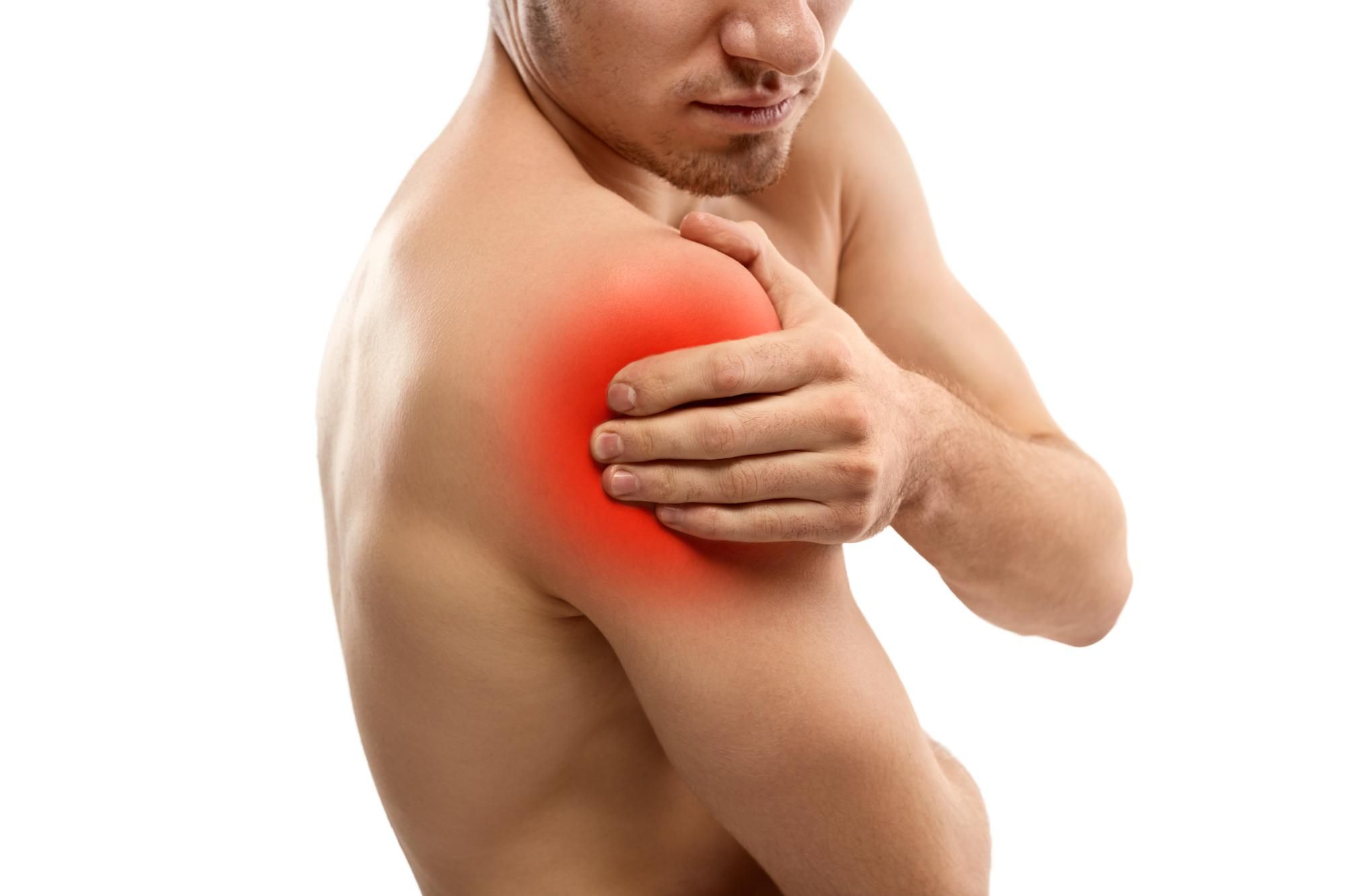 Man experiencing shoulder pain, holding his right shoulder with red shading to highlight pain area – shoulder pain relief and remedial massage.